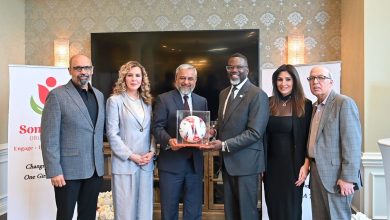 Consul General Zaman Mehdi presents a made-in-Pakistan football to Chicago Mayor Brandon Johnson
