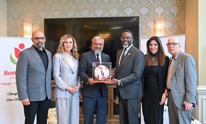 Consul General Zaman Mehdi presents a made-in-Pakistan football to Chicago Mayor Brandon Johnson